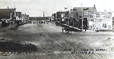 RPPC WESTHOPE N.D. MAIN STREET DIRT OLD WEST ADVERTISING 1910s POSTCARD UNPOSTED picture