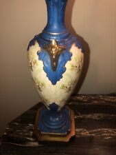 Antique Porcelain Lamp With Floral And Ram Head Detail picture