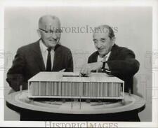 1963 Press Photo Officials study a model of the New York World's Fair Pavilion picture