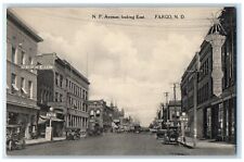 c1930's NP Avenue Looking East Orpheum Stores Fargo North Dakota ND Postcard picture
