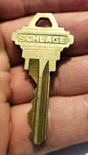 Vintage SCHLAGE Key 98638 C a unique piece that is both functional and decorativ picture