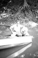Vintage Medium Format Photo Negative 1940 man escapes monster tree roots by boat picture
