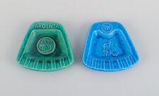 Rörstrand, two ceramic advertising ashtrays in green and blue glaze. picture