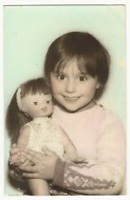 PORTRAIT OF AN ADORABLE LITTLE GIRL HUGGING HER DOLL (AIN’T SHE SWEET) picture