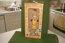 1950'S DONALD DUCK JUMPING JACK TOY IN PACKAGE, DRESSED AS CIRCUS STRONG MAN picture