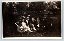 Vintage c.1900 Postcard - Well Dressed Children Posing for Photos in Backyard picture