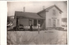 Postcard RPPC Winter Scene Farmhouse Woman Standing Outside picture