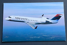 Delta Connection | COMAIR CRJ Aircraft Postcard picture