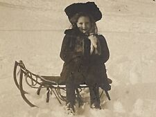 RPPC Cute Little Girl on Sled in Winter Snow Antique Real Photo Postcard c1910 picture