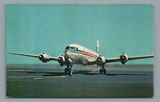 Japan Air Lines DC-6B Pacific Courier Tokyo Airport Vintage Postcard picture