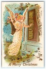c1910's Christmas Angel With Basket Of Toys Embossed Posted Antique Postcard picture