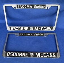 Pair Vintage Tacoma Cadillac Osborne McCann Metal License Plate Frame Washington picture
