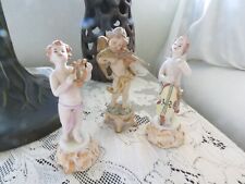 3 Antique Capodimonte or Dresden Cherubs Playing Instruments picture