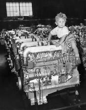 2 year-old Martin Nichols climbs on a diesel engine at the P - 1955 Old Photo 1 picture