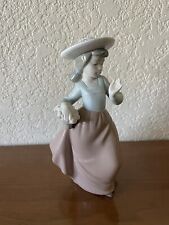 NAO Lladro Girl With Basket Of Flowers Porcelain Figurine, Approx. 7” Tall picture