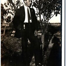 ID'd c1910s Outdoors Young Man RPPC Stand Serious Postcard Ray Stafford A162 picture