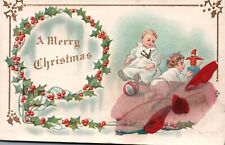 Vintage Postcard A Merry Christmas Children Playing In The Winter Wreath Border picture