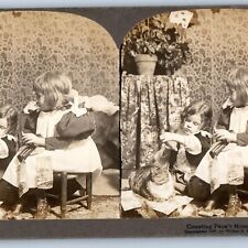 1895 Little Girls Cute Cat Counting Papa's Cash Money Stereoview Real Photo V32 picture