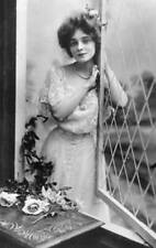 American actress Marie Doro looking through the open window c1900 Old Photo picture