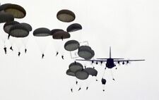US Air Force (USAF) C-130 Hercules aircraft drops US Army (USA) Paratroopers picture