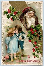 DPO Bryant Iowa IA Postcard Christmas Santa Claus Little Kid Kissing Berries picture