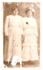 TWO AUSTRALIA ABORIGINAL GIRLS IN DRESS.POSSIBLY SISTERS.VTG REAL PHOTO POSTCARD picture