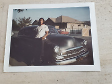 VINTAGE 1970'S PHOTO OF MEXICAN AMERICAN CHICANO TEEN POSING WITH BOMBA CAR picture
