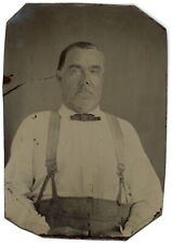 CIRCA 1860'S 2.5X3.63 in 1/6 Plate TINTYPE Stern Man Wearing Suspenders Bow Tie picture
