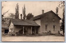 Victorian Era Farmhouse RPPC Man Holding Dog Brick Residence Real Photo Postcard picture