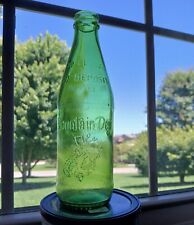 Vintage 1960s Mountain Dew No Deposit No Return 10 Oz Embossed Bottle picture