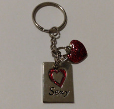 Silvertone Red Heart Sexy Charms Keychain Accessory picture