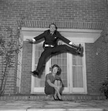 Popular television star Dickie Henderson takes leap joy over a- 1961 Old Photo picture