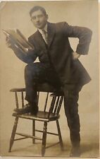 RPPC Man with Newspaper Ernest Clapsaddle Antique Real Photo Postcard c1910 picture