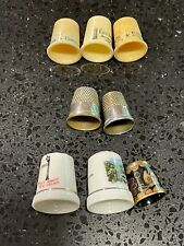 LOT OF 8 ASSORTED THIMBLES, 3 PLASTIC, 2 PORCELAIN, 2 METAL AND 1 CLOISONNE picture