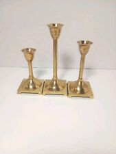 Trio Brass Candlesticks Descending In Height picture