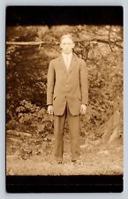RPPC Young Man Stands In The Woods Suit & Tie FASHION VINTAGE Postcard AZO picture