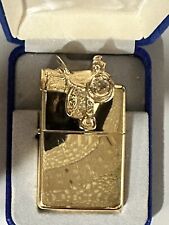Vintage 1995 Sculpted Saddle Gold Plated Zippo Lighter NEW picture