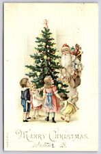 Postcard Merry Christmas, Children, Santa With Toy Bag, Tree, DB 1908  picture