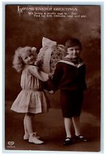 c1910's Easter Greetings Children Carrying Pretty Egg EAS RPPC Photo Postcard picture