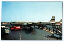 c1960's Continental Airlines DC7B Unloading Passengers Los Angeles CA Postcard picture