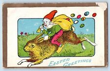 Easter Postcard Greetings Elf Gnome Riding Big Rabbit With Eggs c1910's Antique picture