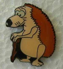 Hedgehog pin badge. Cartoon Walking stick style. Injured. Metal. Enamel picture