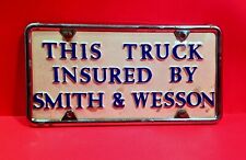 Vintage 1960's 70's This Truck  Insured By Smith & Wesson License Plate W/ Frame picture