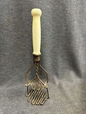 Unusual Vintage Spring Loaded Twisted Wire Potato Masher picture