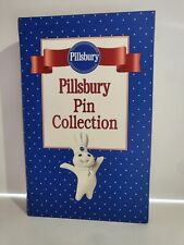 PILLSBURY DOUGHBOY 8 PIN COLLECTION by Danbury Mint DISPLAYED IN BOOK BOX picture