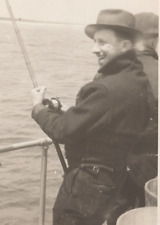 5G Photograph Handsome Smiling Man Reeling In A Fish Fisherman 1930's 5x7 picture