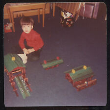 FOUND PHOTO Lot Little Boy Playing with Lincoln Logs 70s Snapshot VTG picture