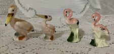 Two Miniature Flamingo And Two Miniature Pelicans  picture