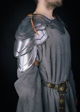 Fantasy warrior shoulder armor, blackened and golden shoulder picture