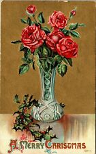 Vintage 1910's Red Roses Vase Holly Leaves Merry Gold Foil Christmas Postcard picture